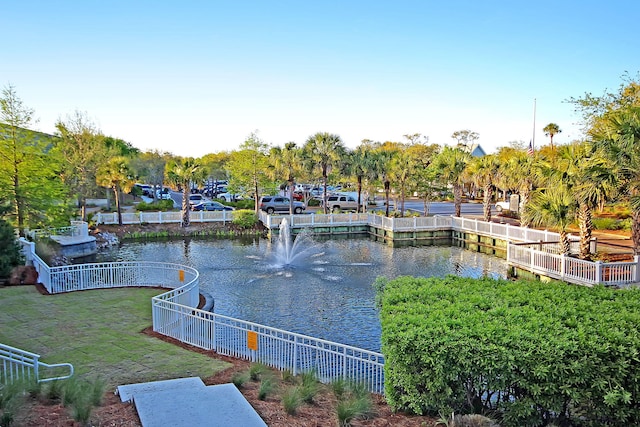 view of water feature with fence