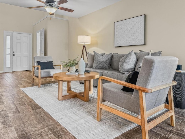 living room with ceiling fan and hardwood / wood-style floors