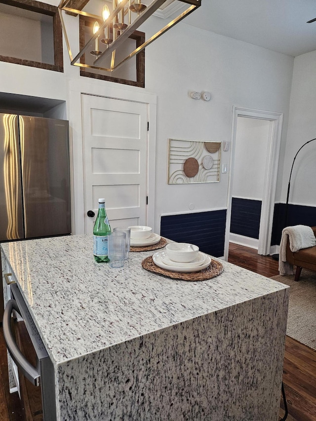 dining space with dark hardwood / wood-style floors