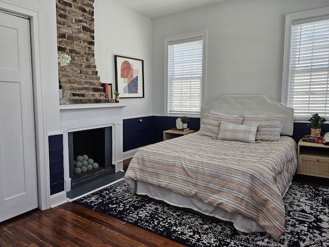 bedroom featuring dark hardwood / wood-style flooring