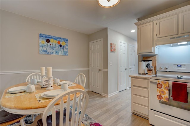 dining room with light wood-type flooring