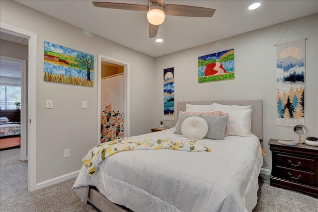 carpeted bedroom with ceiling fan