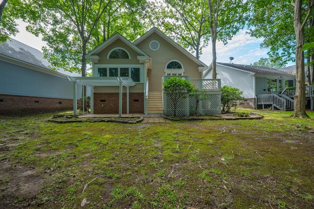 9175 Spring Branch Ct, North Charleston, SC 29406 - view of front of house featuring a patio area, crawl space, a wooden deck, a front lawn, and brick siding