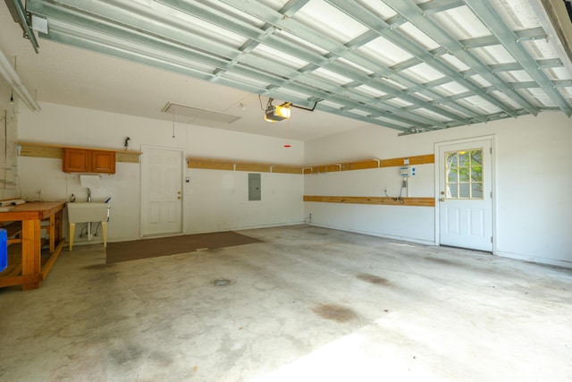 9175 Spring Branch Ct, North Charleston, SC 29406 - garage with a garage door opener and electric panel