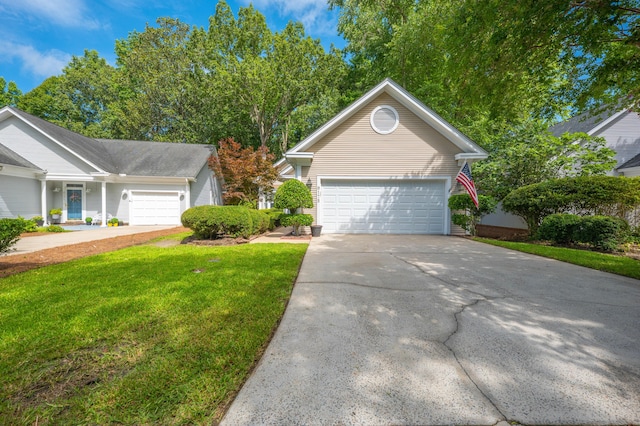 9175 Spring Branch Ct, North Charleston, SC 29406 - view of front of house featuring a front lawn, concrete driveway, and a garage