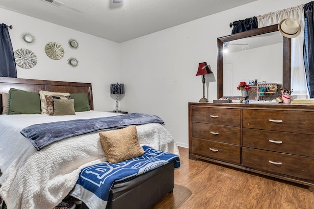 bedroom featuring light hardwood / wood-style floors