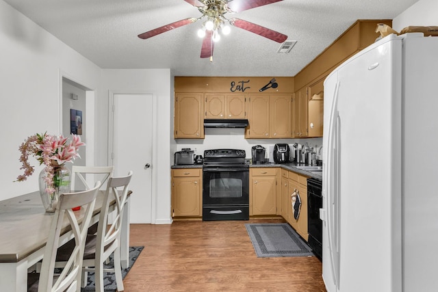 kitchen featuring ceiling fan, black appliances, light hardwood / wood-style floors, and a textured ceiling