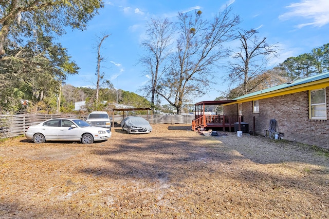 view of yard featuring a wooden deck