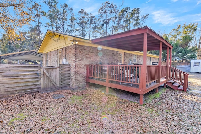 view of home's exterior featuring a deck