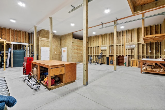 interior space with a workshop area and recessed lighting