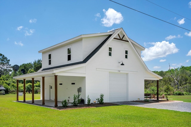view of property exterior with a yard and driveway