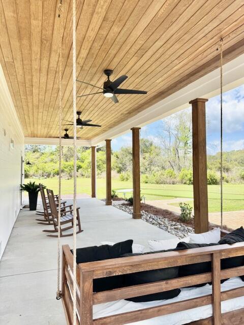 view of patio with ceiling fan and covered porch