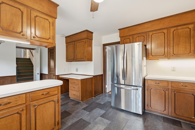 kitchen with ceiling fan and stainless steel refrigerator