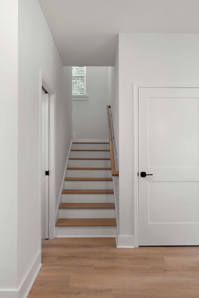 866 Tripe St, Charleston, SC 29407 - stairway with wood finished floors and baseboards