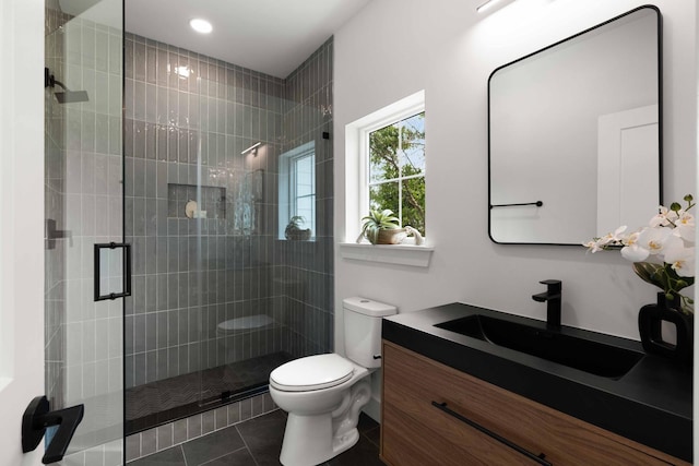 866 Tripe St, Charleston, SC 29407 - bathroom with toilet, vanity, a stall shower, tile patterned floors, and recessed lighting