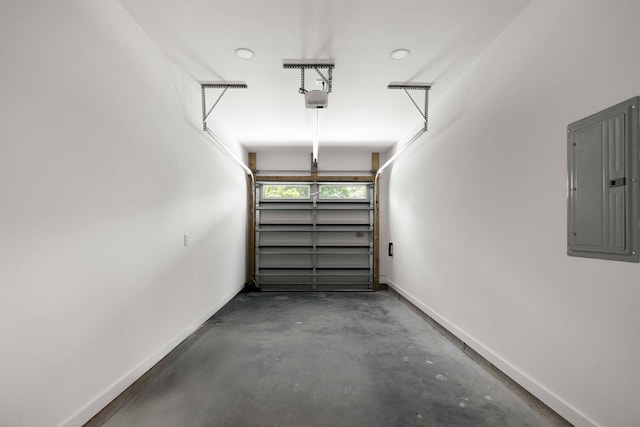 866 Tripe St, Charleston, SC 29407 - garage featuring electric panel, a garage door opener, and baseboards