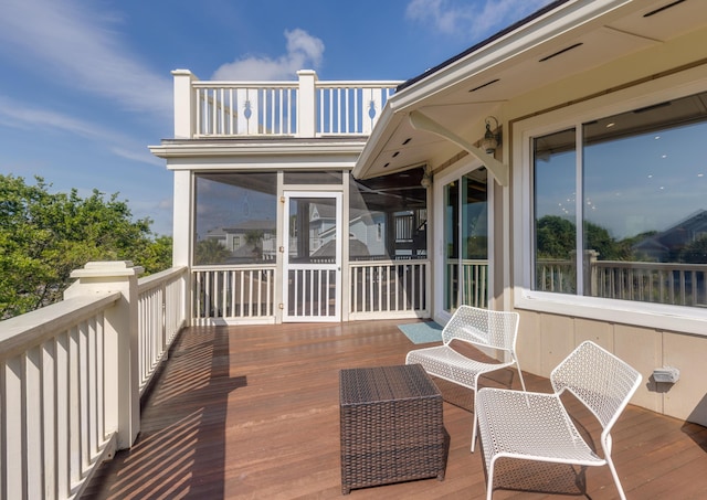 deck featuring a sunroom