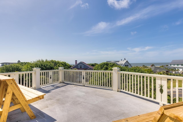 view of patio with a water view
