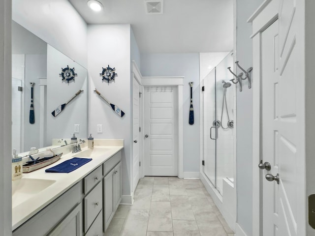 bathroom featuring walk in shower and vanity