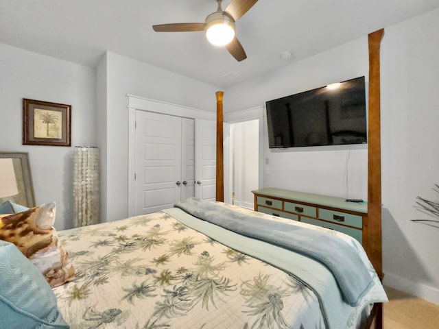 bedroom featuring a closet, carpet flooring, and ceiling fan