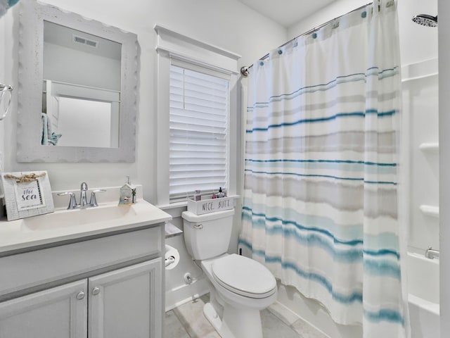 full bathroom with toilet, shower / tub combo, and vanity