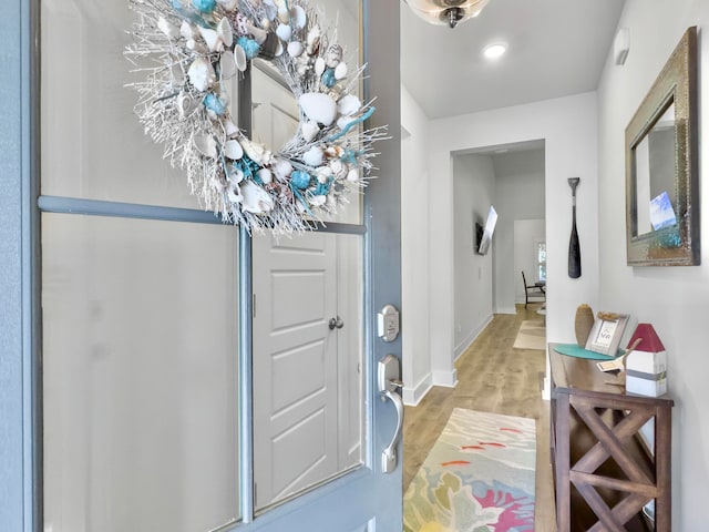 entrance foyer with light hardwood / wood-style floors