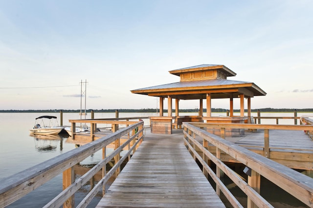 dock area featuring a water view and a gazebo