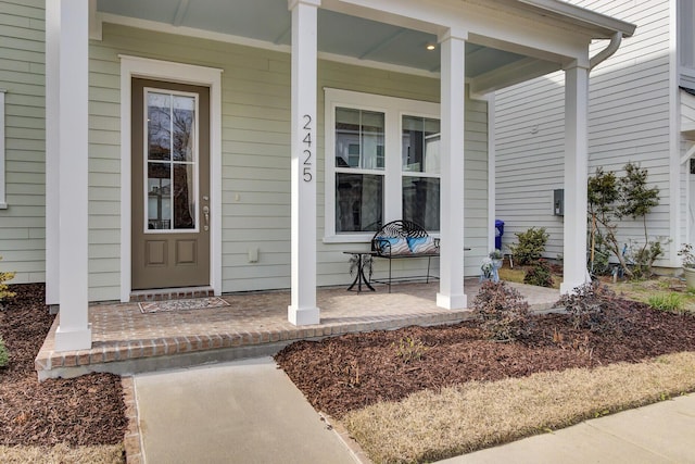 entrance to property with a porch