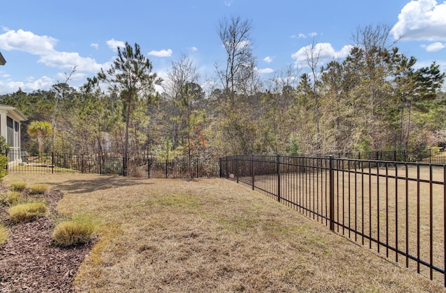 view of yard with a fenced backyard