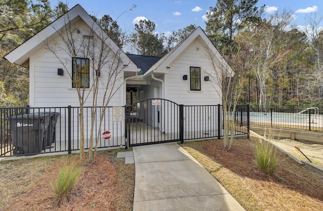 view of front facade featuring a gate and fence