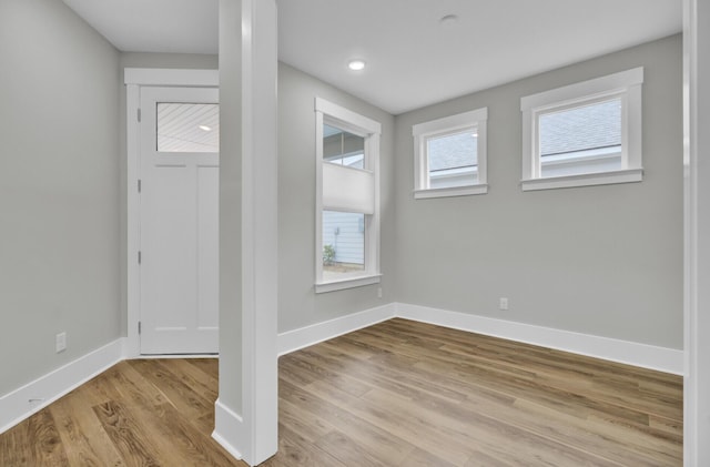 foyer with light wood-type flooring