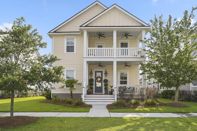 1713 Banning St, Mount Pleasant, SC 29466 - view of front of home featuring a ceiling fan, a front yard, board and batten siding, covered porch, and a balcony