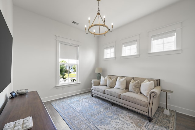 1713 Banning St, Mount Pleasant, SC 29466 - living area featuring a chandelier and wood finished floors