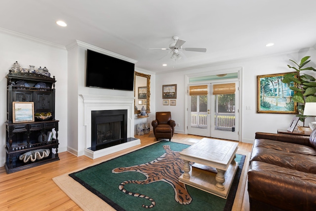 601 King Haven Ln, Johns Island, SC 29455 - living area featuring ceiling fan, light wood-type flooring, crown molding, recessed lighting, and a fireplace with raised hearth