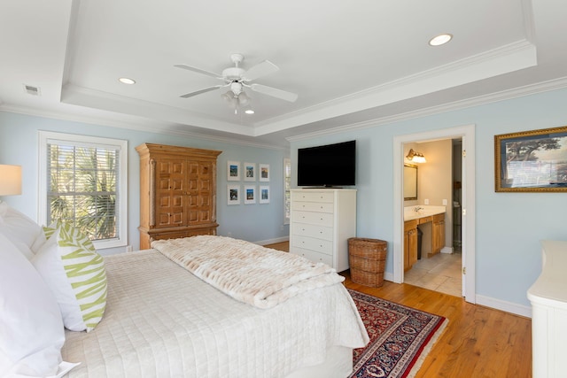 601 King Haven Ln, Johns Island, SC 29455 - bedroom with a raised ceiling, light wood-style flooring, crown molding, recessed lighting, and ceiling fan
