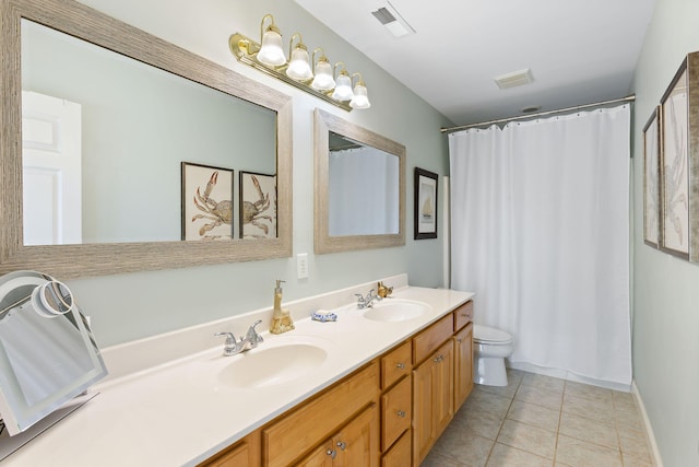 601 King Haven Ln, Johns Island, SC 29455 - full bathroom featuring tile patterned floors, toilet, double vanity, and curtained shower