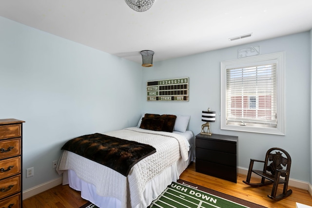 601 King Haven Ln, Johns Island, SC 29455 - bedroom with wood finished floors and baseboards