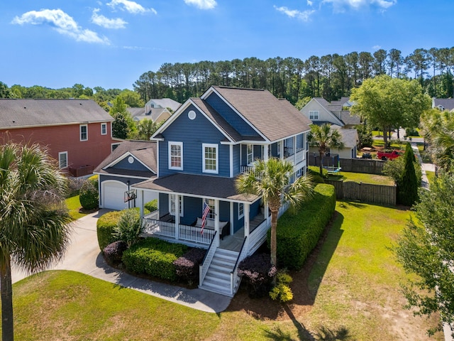 601 King Haven Ln, Johns Island, SC 29455 - view of front of house featuring a porch, driveway, a residential view, a garage, and stairway