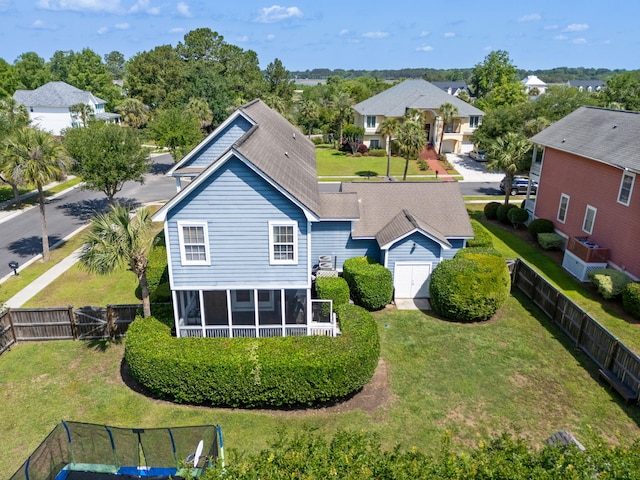 601 King Haven Ln, Johns Island, SC 29455 - back of property featuring a residential view, a sunroom, and a gate