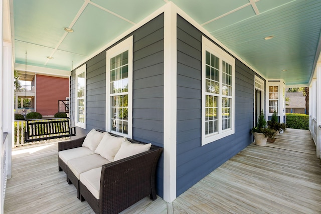601 King Haven Ln, Johns Island, SC 29455 - wooden deck featuring a porch and an outdoor living space