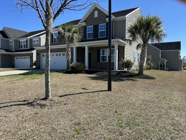 view of front of home featuring brick siding, driveway, and an attached garage