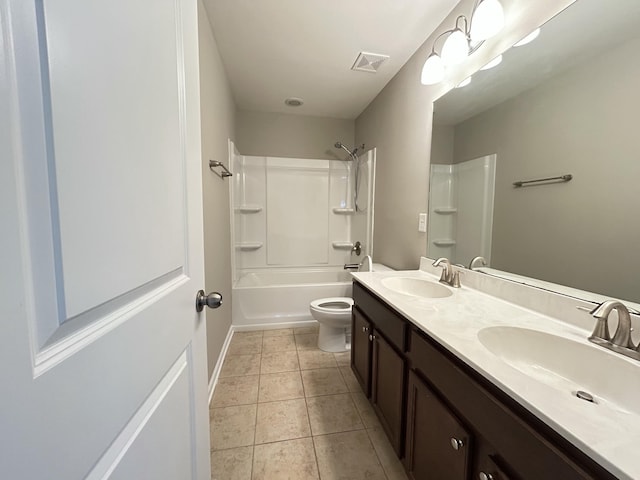 full bathroom featuring toilet, bathing tub / shower combination, a sink, and tile patterned floors