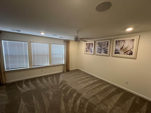 carpeted empty room with visible vents, recessed lighting, a ceiling fan, and baseboards