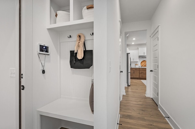 mudroom featuring wood-type flooring