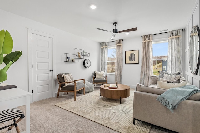 living area featuring visible vents, recessed lighting, a ceiling fan, and carpet floors