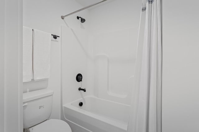 full bath featuring toilet and shower / tub combo