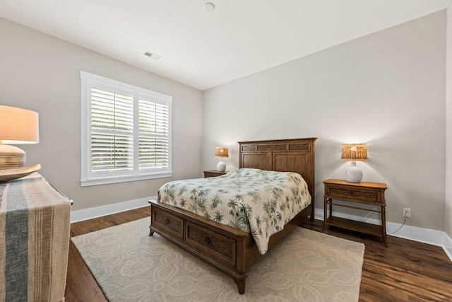 2208 Primus Rd, Mount Pleasant, SC 29466 - bedroom with baseboards and dark wood-type flooring