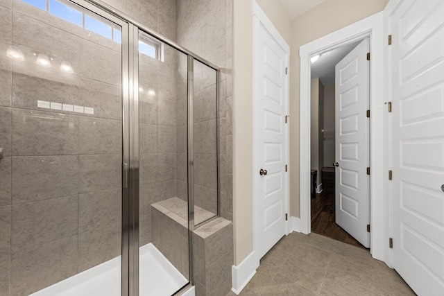 2208 Primus Rd, Mount Pleasant, SC 29466 - bathroom with a shower stall, tile patterned floors, and baseboards
