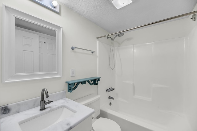 bathroom with bathing tub / shower combination, a textured ceiling, vanity, and toilet