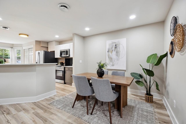 1161 Monaco Dr, Mount Pleasant, SC 29464 - dining area with light wood finished floors and recessed lighting